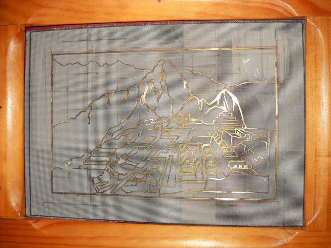 Riproduzione in filigrana di una vista di Machu Picchu per souvenirs turisti
