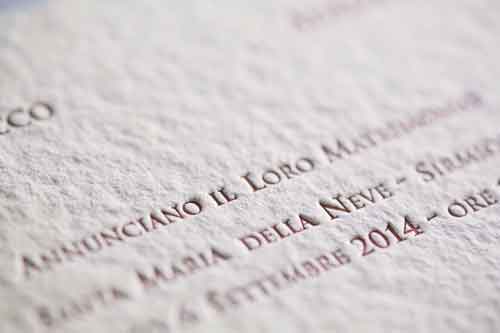 Detail of a classic wedding invitation printed in letterpress